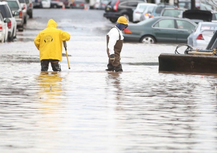 A water main broke at Park Ave and North 5th Street causing flooding that damaged cars and homes on Monday, in Newark, NJ. 10/30/17 (Ed Murray | NJ Advance Media for NJ.com)