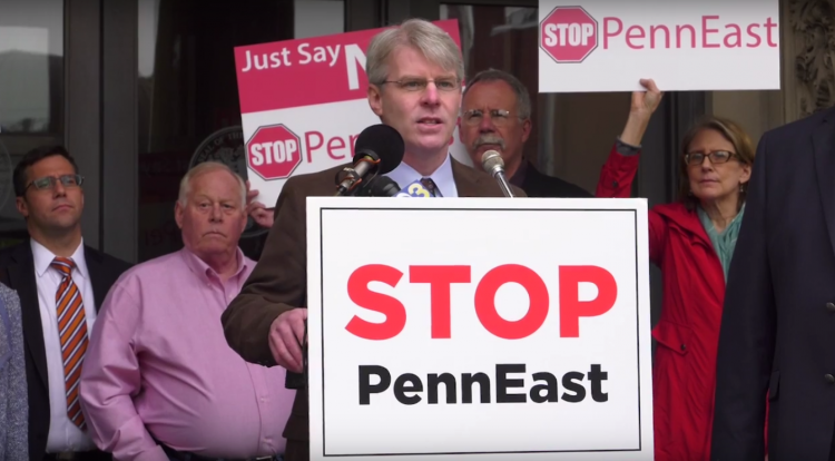 Ed Potosnak looks on as Tom Gilbert speaks against the PennEast pipeline